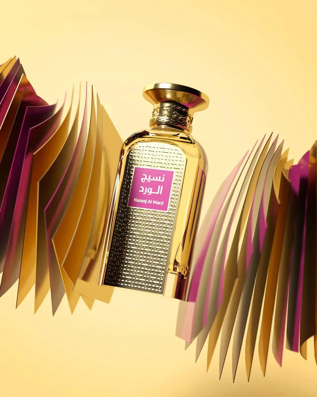 The image shows a tall, rectangular glass perfume bottle with a gold cap, against a gradient yellow background. The bottle is flanked by abstract, fan-like paper art in shades of purple, gold, and pink, which creates a dynamic and modern frame around the product.  The combination of the colorful background and the golden accents gives the image a warm, vibrant feel, suggestive of luxury and style.