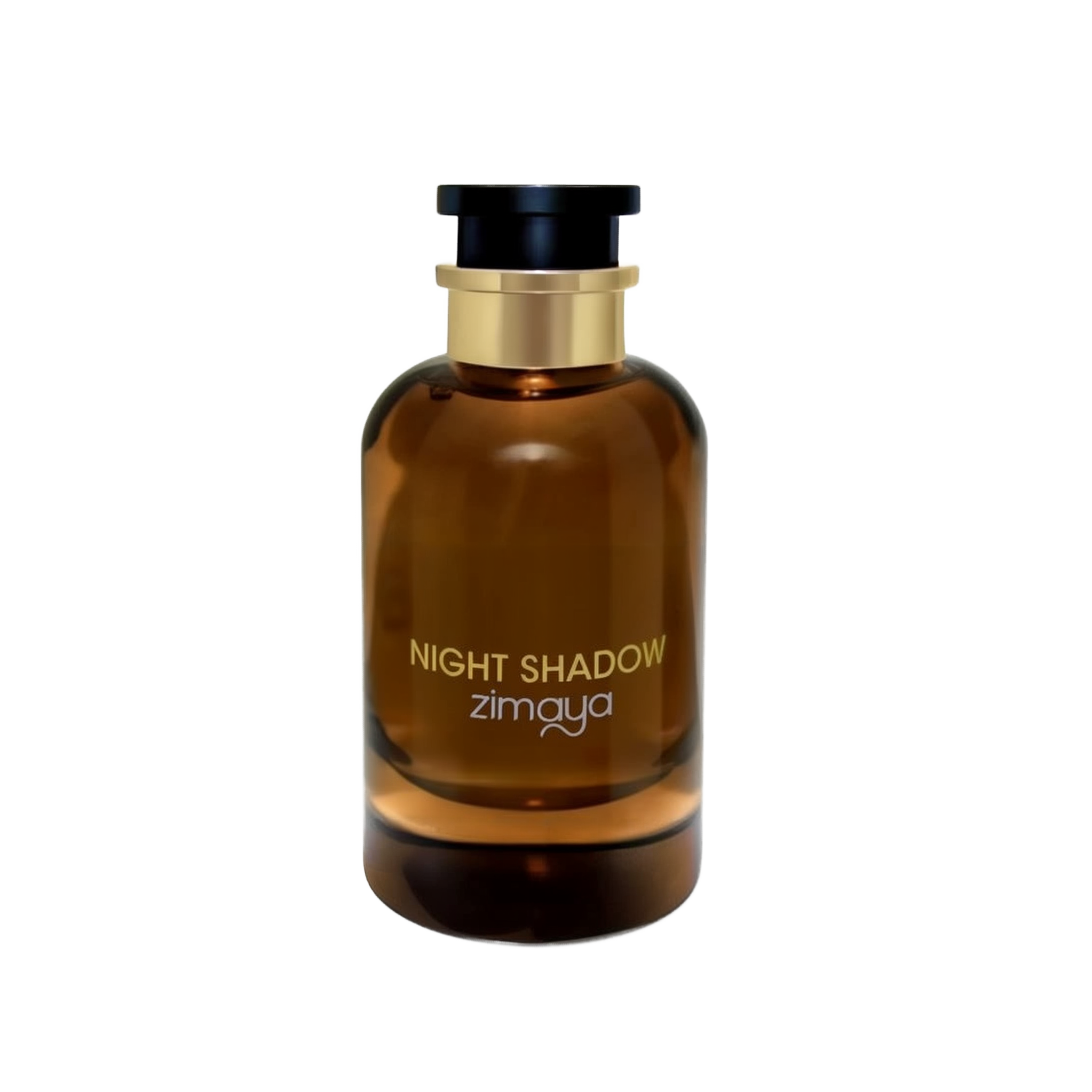 The image shows a cylindrical amber glass perfume bottle with a black cap and a gold band around the neck. The bottle has the text "NIGHT SHADOW" printed in large, capitalized, serif font in the center, with the brand name "zimaya" in a smaller, simple font below. The background is plain and white, highlighting the product.