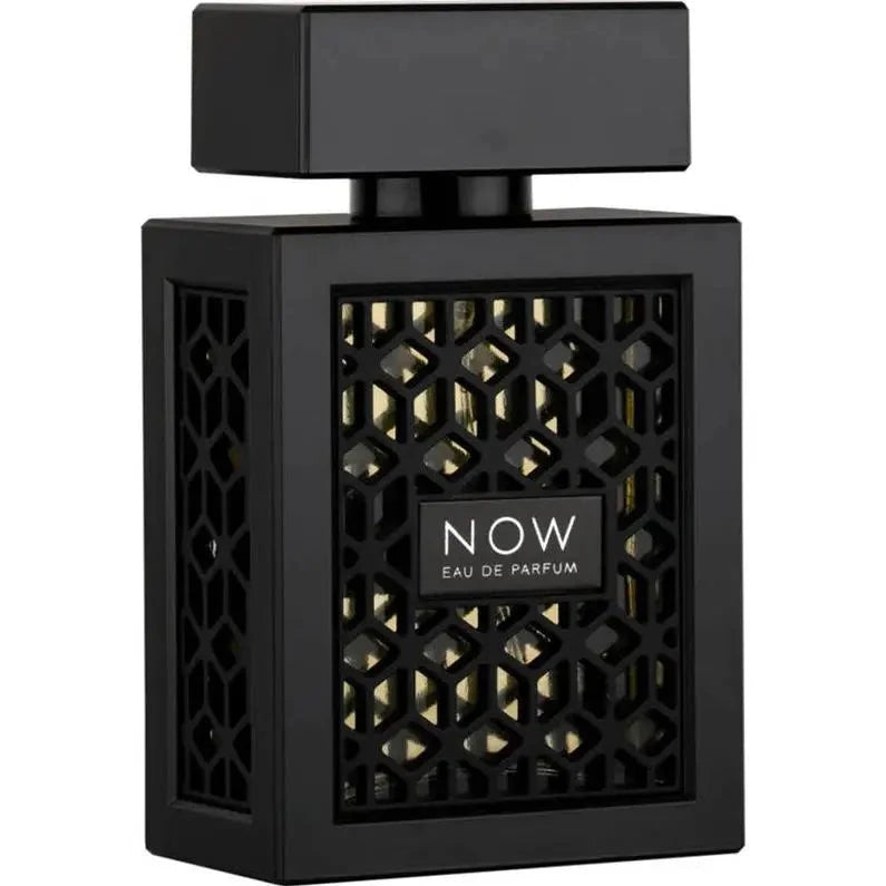The image features a black perfume bottle with a distinctive design:  The bottle is square-shaped with a flat, rectangular black cap. It features a black geometric lattice design on the front, revealing a gold backdrop. Centered on the lattice is a white label with the text "NOW EAU DE PARFUM" in bold lettering. The design of the bottle exudes a contemporary and stylish look, suggesting a luxury fragrance.