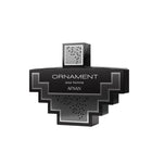 The image features a striking, black perfume bottle with a unique, angular, cross-like shape. The design is accented with silver detailing that follows the bottle's geometric contours. The label reads "ORNAMENT pour homme AFNAN," indicating that it is a fragrance for men by AFNAN. The cap has a silver, mesh pattern, complementing the bottle's modern aesthetic. The overall design exudes sophistication and a contemporary feel.