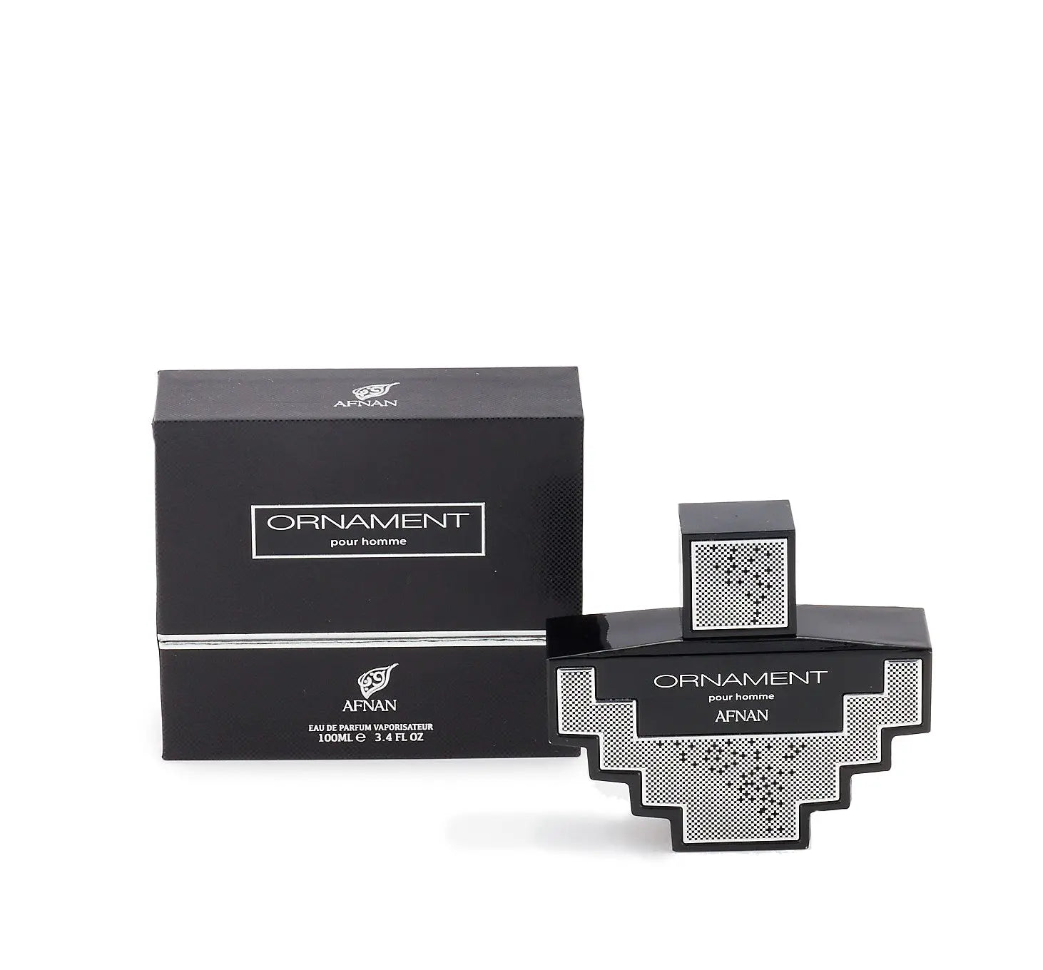 The image depicts a black and silver geometric-shaped perfume bottle with the label "ORNAMENT pour homme AFNAN" next to its packaging. The packaging box is black with a silver band and the same branding as the bottle. The text "Eau de Parfum Vaporisateur 100ML e 3.4 FL OZ" is visible, detailing the product's type and quantity. The design is sleek, modern, and suggests a masculine fragrance.