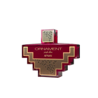 The image shows a perfume bottle with a distinctive design. The bottle is a deep purple color with a complex, geometric shape reminiscent of an ornament or a cross with stepped arms extending from the central square. The center of the bottle features a patterned gold grid design that contrasts with the purple. The cap is square and mirrors the same gold grid pattern. 