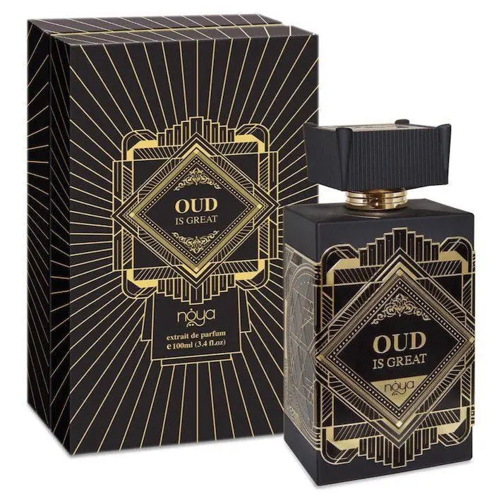 The image features a perfume set called "OUD IS GREAT" by the brand Noya. It includes a square, dark-colored bottle with a ribbed black cap and a golden ring around the neck. The front of the bottle displays an intricate geometric and Art Deco-style golden design framing the bold, capitalized text "OUD IS GREAT" set against a black background. The text "noya" appears in a smaller font at the bottom, indicating the brand. 