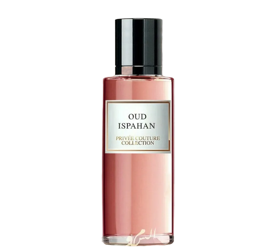 The image shows a slender rectangular perfume bottle with a rosy pink liquid inside, suggesting a feminine and sophisticated fragrance. The bottle has a simple black cap that contrasts with its body. The label is elegantly framed, featuring the name "OUD ISPAHAN" in capital letters, and below in smaller font, "PRIVÉE COUTURE COLLECTION".