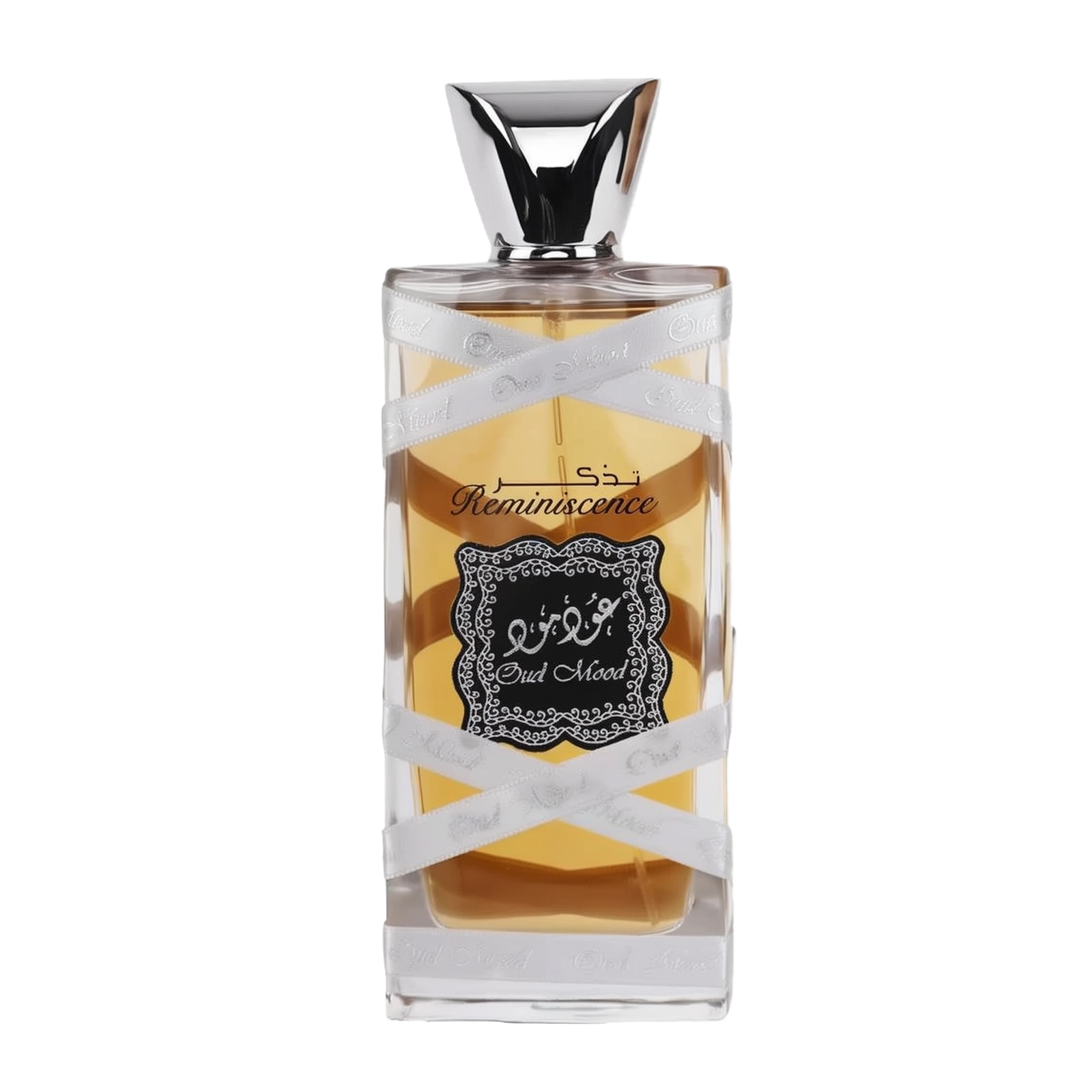 The image displays a perfume bottle with the following attributes:  The bottle is rectangular with a clear glass design, allowing a view of the amber-colored perfume inside. A silver ribbon with the words "Oud Mood" printed in a repeating pattern wraps around the bottle. The central label is ornate with a black background and white decorative border; it features Arabic calligraphy and the word "Reminiscence" in English script.