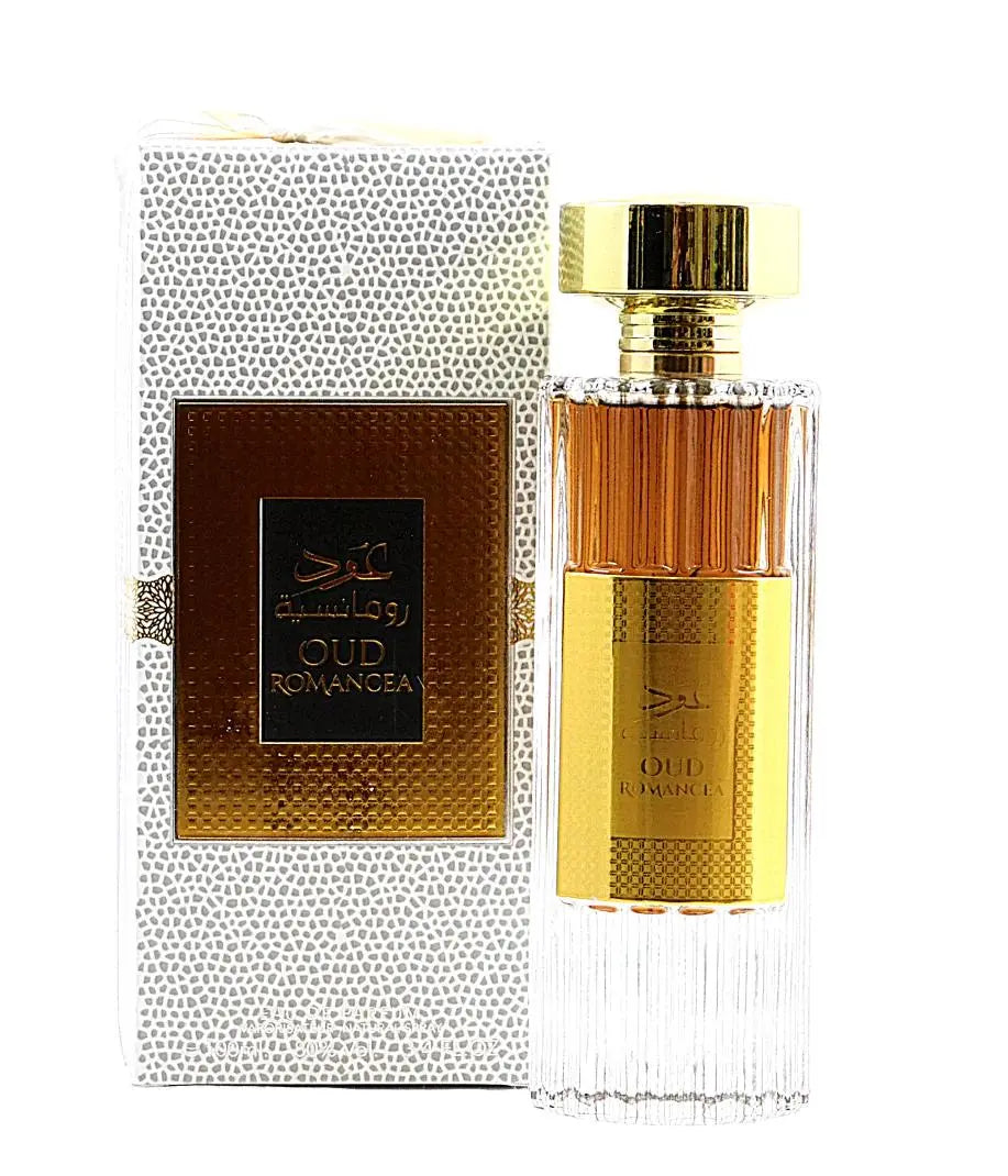 The image displays a perfume set that includes a rectangular glass bottle and a packaging box. The bottle has a clear textured lower half and a smooth amber upper half, with a golden cap and a golden label featuring "Oud Romancea" written in both Arabic and English. The perfume liquid is visible with a warm amber tone. The box is white with a delicate grey pattern and a central brown label with a golden border, displaying the same "Oud Romancea" branding as on the bottle. 