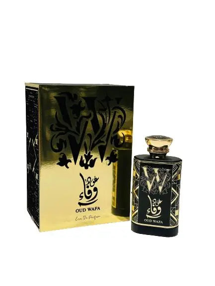 The image depicts a perfume set named "OUD WAFA" by Ard Al Zaafaran. On the left is the packaging, a reflective golden box with a cut-out design that reveals a black interior. The perfume's name is written in a stylized Arabic script on the box. On the right side of the image is the bottle, which has a black body with golden patterns and typography that match the box's design. The cap of the bottle is golden and appears to have a textured finish.