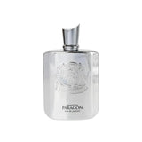 The image shows a bottle of "Phantom Paragon" eau de parfum by Zimaya. The bottle is sleek and rectangular with a highly reflective, polished silver finish. It features an ornate embossed crest near the top, adding a touch of elegance and luxury. Below the crest, the text reads "PHANTOM PARAGON" and "eau de parfum" in black. The bottle has a modern, angular silver cap that complements its sophisticated design.