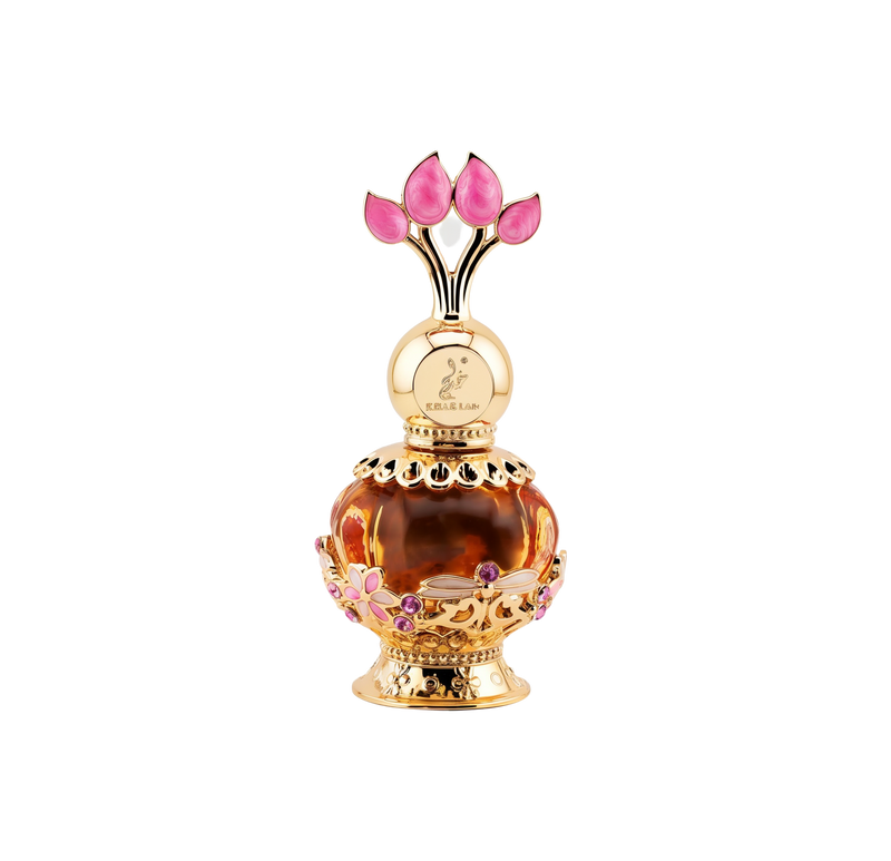 The image features a luxurious perfume bottle from Khadlaj called Pink Musk. The bottle is a decorative orb with a transparent amber body and intricate gold filigree details, including floral motifs with pink and purple crystal embellishments. The cap is a stylized design with three pink petal-shaped crystals, evoking the image of a flower or tulip. The perfume's name and the brand "Khadlaj" are inscribed on the golden neck of the bottle.