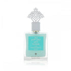 An elegant perfume bottle with a light blue liquid is centered against a pure white background. The bottle features a silver cap with an intricate, decorative design resembling a traditional arabesque motif. The label on the bottle has text in Arabic and English stating "POWDER MUSK, IBRAHEEM ALQURASHI SPECIAL". The branding includes the distinctive logo of Ibraheem Al Qurashi at the bottom of the label.