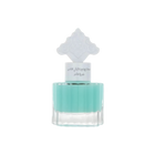 The image features a transparent glass bottle filled with a teal-colored liquid, suggesting a fragrance or scented product. The bottle has a unique, white ornate cap that resembles traditional Middle Eastern pattern.