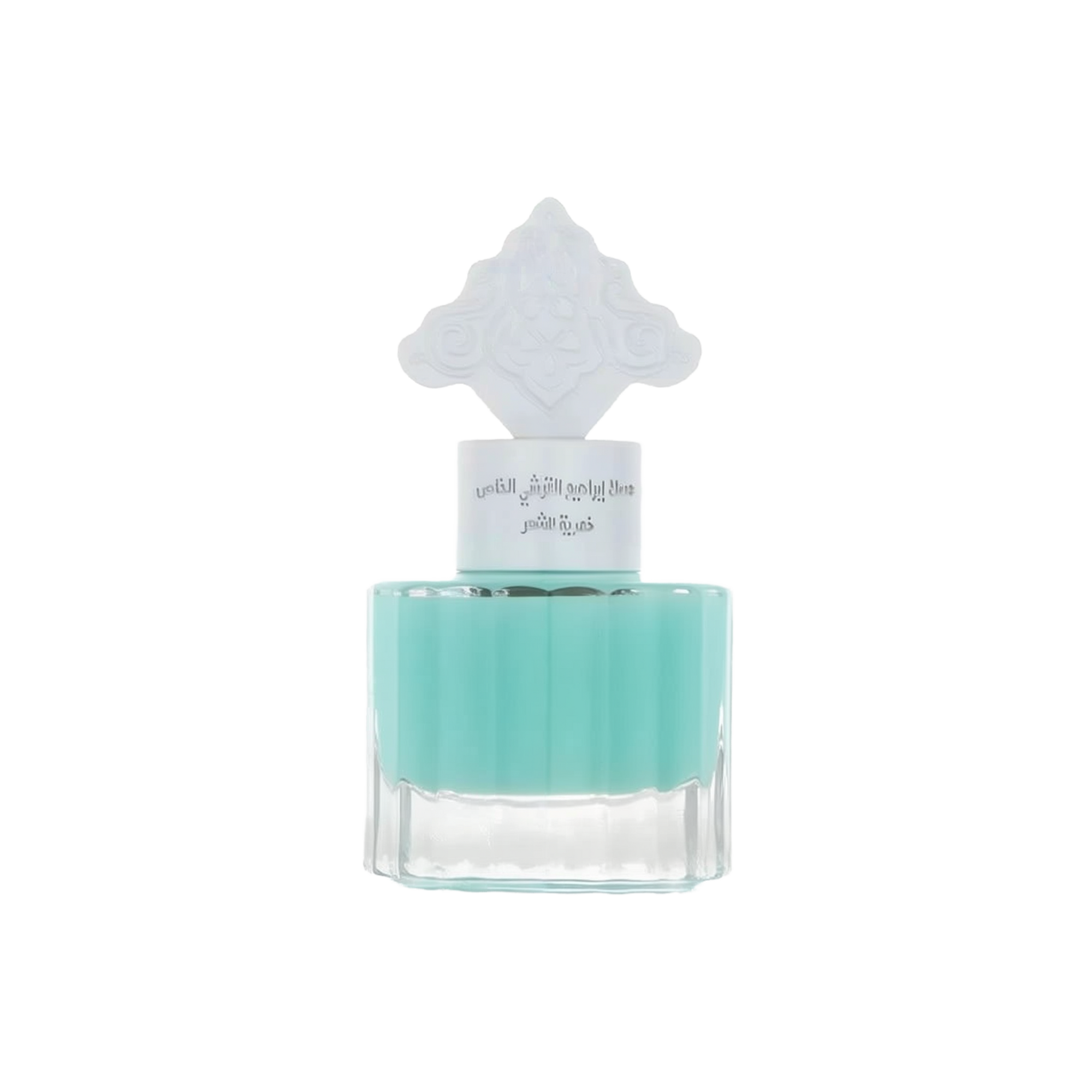 The image features a transparent glass bottle filled with a teal-colored liquid, suggesting a fragrance or scented product. The bottle has a unique, white ornate cap that resembles traditional Middle Eastern pattern.