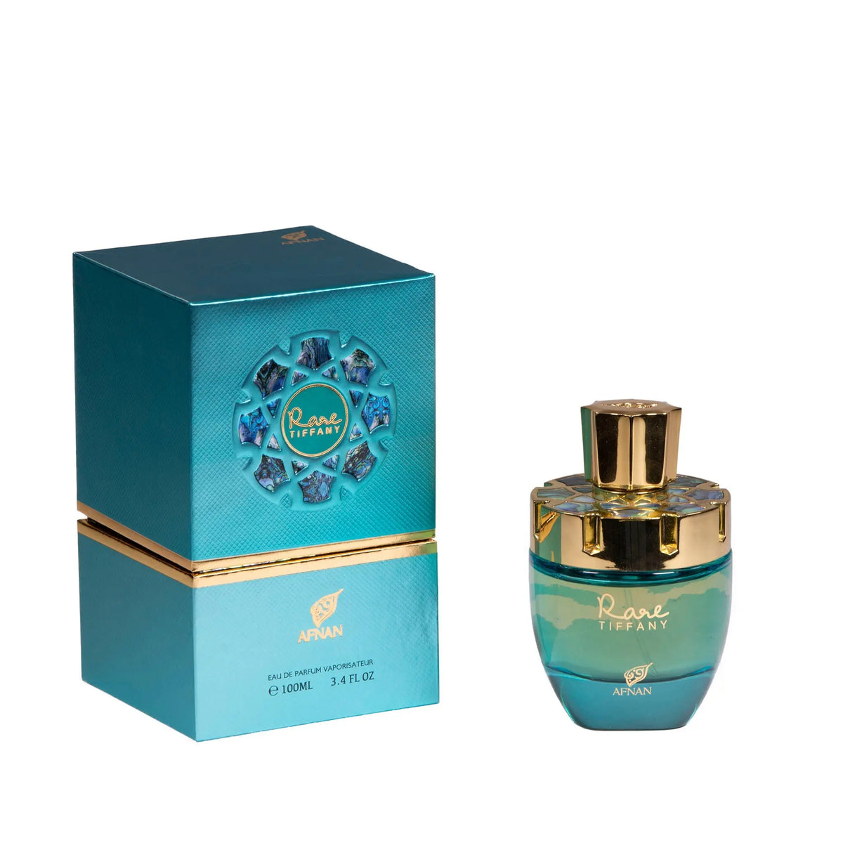 The image displays a perfume product consisting of a bottle and its packaging box. The bottle, as described previously, has a rounded shape with a tapering top, made of translucent teal glass with a golden cap featuring a faceted design. Accompanying the bottle is a square box with a textured teal surface and gold accents along its lower edge.  The overall presentation of the product suggests a luxurious and sophisticated fragrance.