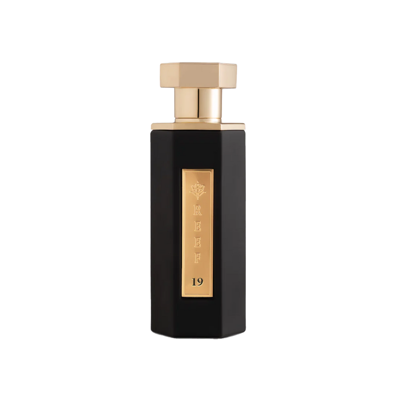 Tall black perfume bottle with gold hexagonal cap and vertical gold plaque marked Reef 19.