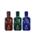 This image features a set of three distinct perfume bottles from DKHAN Fragrances, each containing 50ml of Eau de Parfum. From left to right: the first bottle is maroon with a matching geometric cap and a gold tag, the second bottle is emerald green with a gold tag, and the third is cobalt blue with a gold tag. Each bottle has a marbled effect and is adorned with the DKHAN logo and 'INTENSE' in gold lettering, along with the brand's emblem, a heart within a diamond shape.