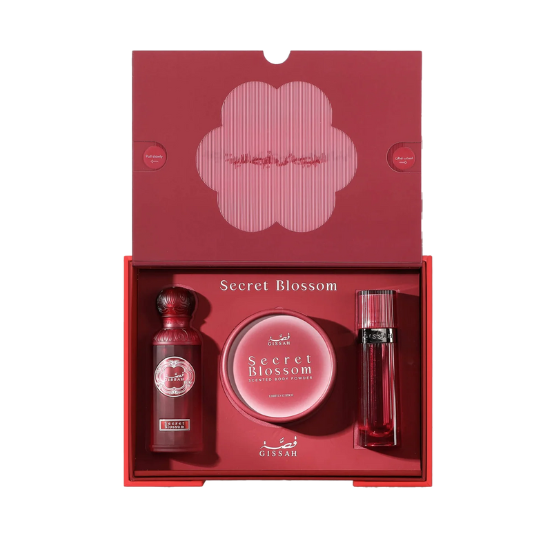 Gissah Secret Blossom gift set with perfume, scented body powder, and body spray in red packaging.