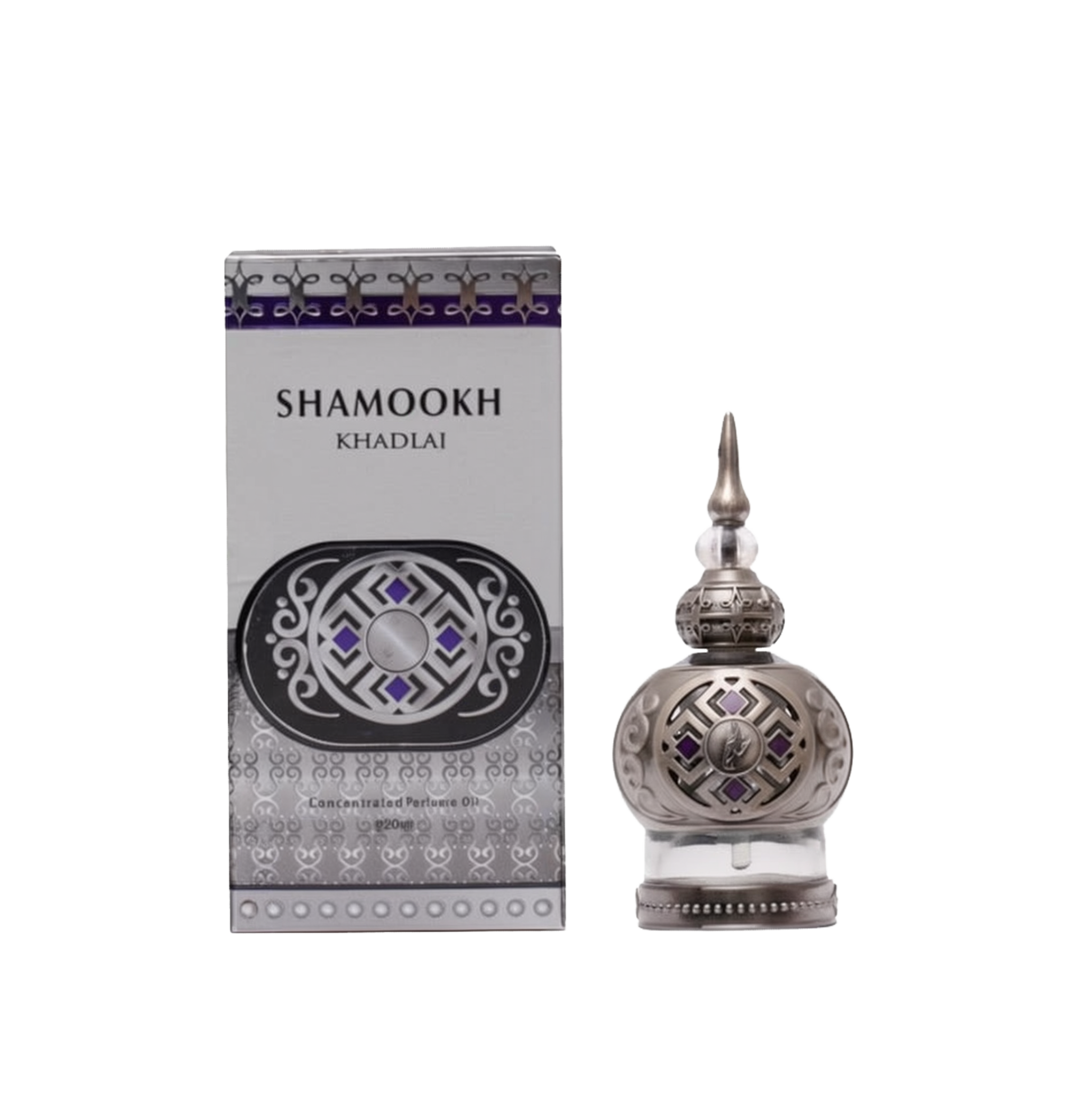 The image shows a product called "Shamookh" by Khadlaj, which is a concentrated perfume oil. The perfume comes in a 20ml spherical bottle with a silver finish, featuring intricate patterns and a pointed cap that adds a touch of elegance. The design includes decorative elements with purple accents, enhancing its luxurious appearance. The packaging box matches the bottle's design, with a silver and purple theme, featuring the product name "Shamookh" in bold letters and additional ornamental details.