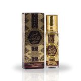 The image shows a product named "Shams Al Emarat Khususi," which is a roll-on perfume oil by Ard Al Zaafaran. The product is contained in a small 10 ml (0.34 fl. oz.) glass bottle with a golden cap. The bottle and its accompanying box feature an ornate design with gold and dark brown patterns.