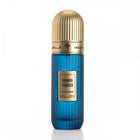 The image shows a sleek perfume bottle with a deep blue, vertically ribbed body and a shiny gold cap. The central label is a gold plaque with "SPANISH TOBACCO" prominently displayed, along with "Extrait de parfum 100 ml 3.4 fl.oz." written underneath. The Ibraheem Al Qurashi branding is visible at the top of the bottle. The clean white background emphasizes the bottle's vivid color and elegant design.