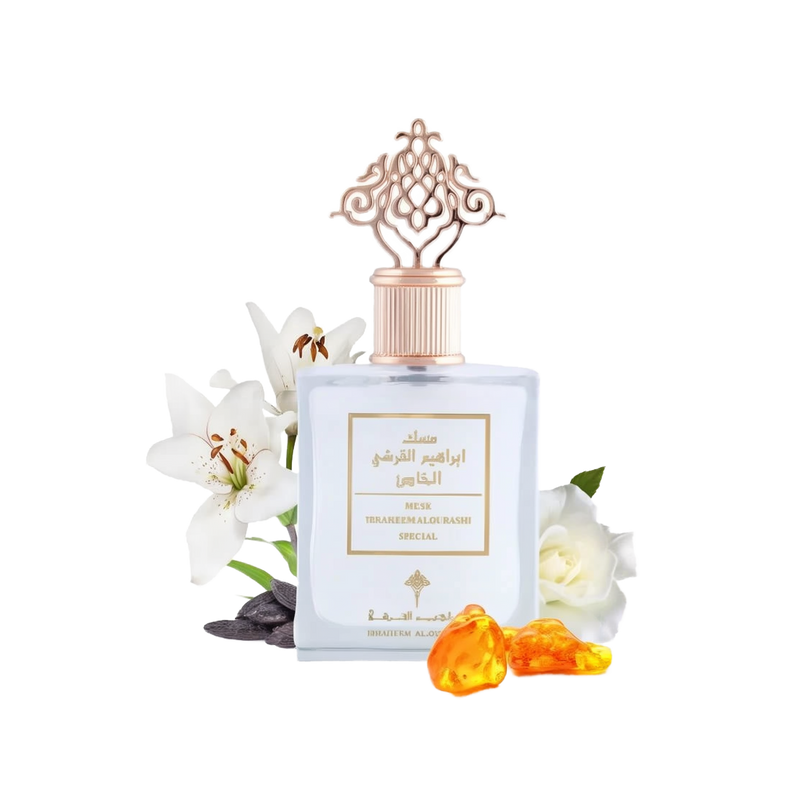 A bottle of 'Special Musk' by Ibraheem Al Qurashi, with a sophisticated design. The perfume bottle is square with a soft blue color and a rose gold ornate cap that features an intricate lattice design. The label has Arabic calligraphy and English text. It is presented with a backdrop of white flowers, possibly lilies, and a white rose, along with two amber-colored resin pieces in front, suggesting a luxurious and aromatic product.