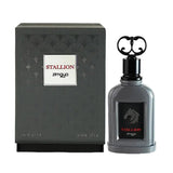 The image shows a bottle of "Stallion" eau de parfum by Zimaya alongside its packaging. The perfume bottle is glossy gray with a rectangular shape and rounded edges. It has a black cap with an ornate, circular handle on top.  The packaging box matches the bottle's elegant design. It is dark gray with an intricate, subtle pattern and features a white square label with the text "STALLION" in red and "zimaya" in black.