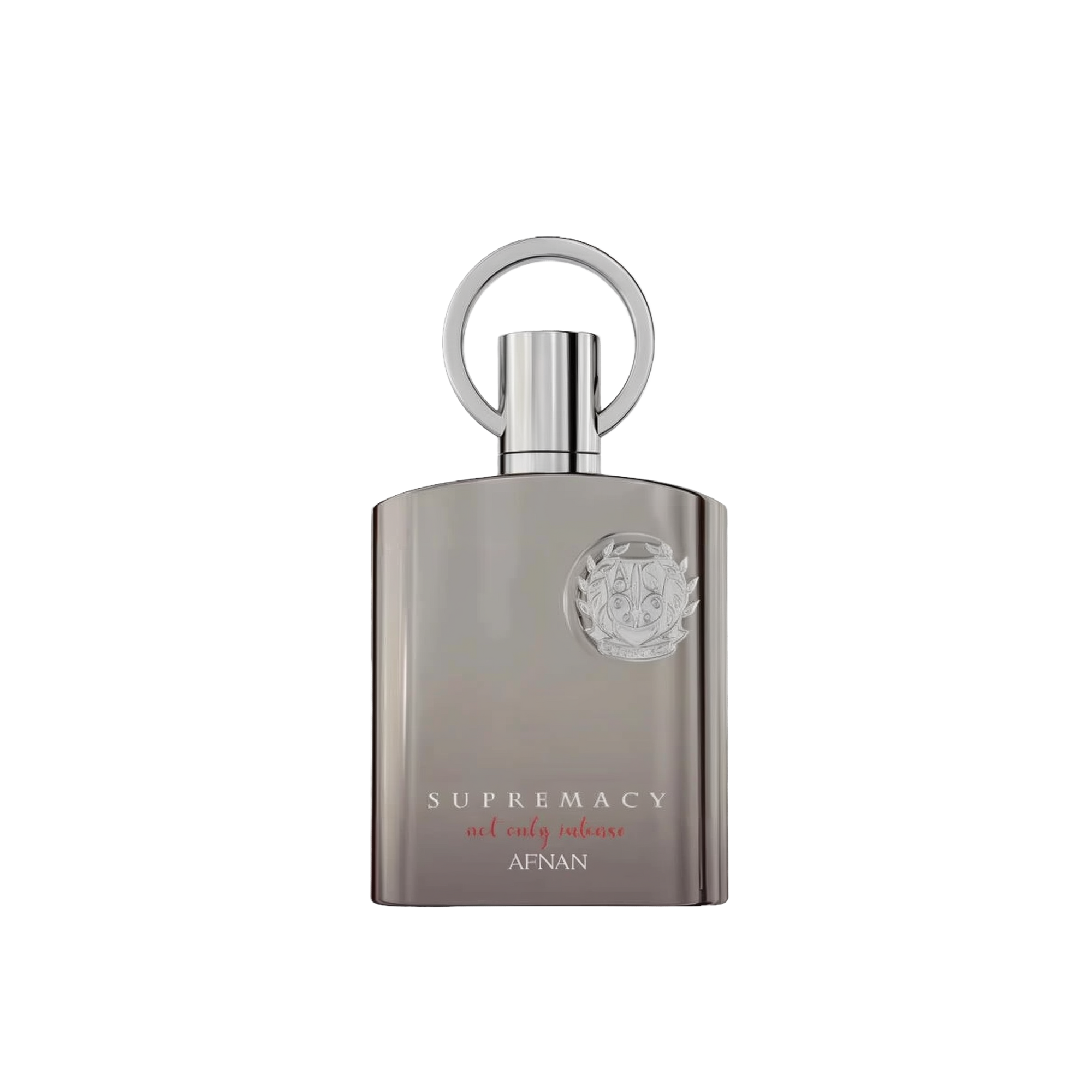 The image shows a perfume bottle with a sleek, modern design. The bottle is a muted silver-gray with a matte finish and a flat, rectangular shape. The cap is silver and features a prominent circular loop, which adds a touch of sophistication. Emblazoned on the front of the bottle is a raised silver emblem that adds a 3D effect, and below it, the words "SUPREMACY not only intense AFNAN" are printed in a subtle, elegant font. 