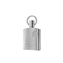Supremacy Silver by Afnan the bottle featuring a sleek, reflective metallic finish & a round handle-style cap.
