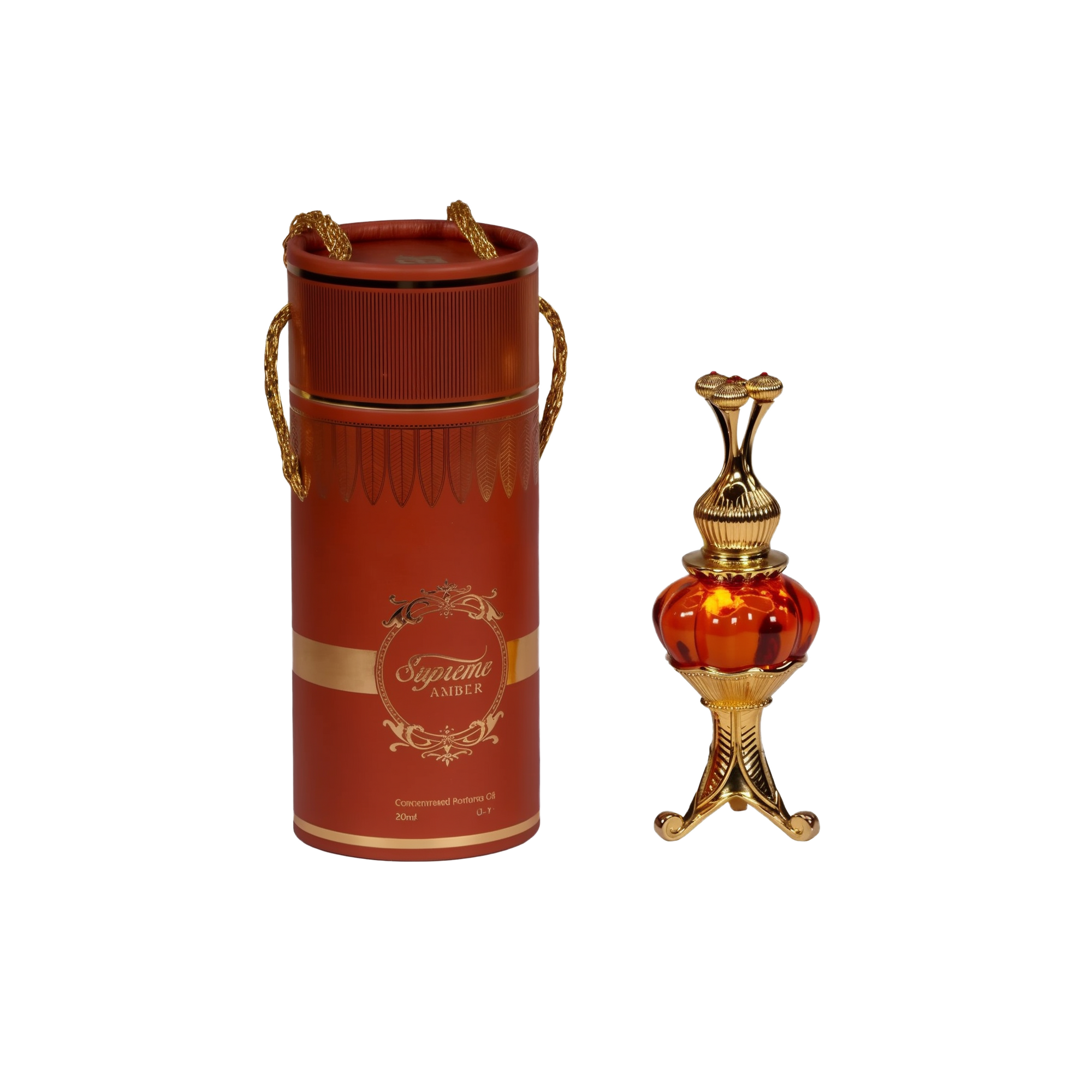 The image features an ornate perfume oil set, consisting of a cylindrical red container with gold trim and decorative elements, and a luxurious golden and red glass perfume oil bottle with an intricate metallic design. The container has a lid with two golden, braided rope-like handles and displays the text "Supreme AMBER" in a decorative golden font, with a smaller inscription "Concentrated Perfume Oil 20ml" below. 