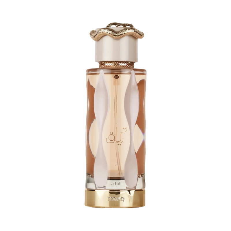 The bottle has a sleek, elongated shape with a clear glass revealing the amber-colored perfume inside.