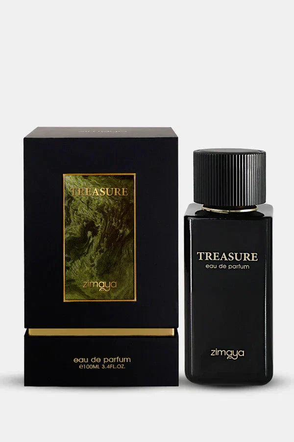 An image of "Treasure" Eau de Parfum by Zimaya, showcased next to its packaging. The bottle maintains a sleek, matte black finish with "TREASURE" and "zimaya" printed in white on its surface. Accompanying it is a matching black box that features a textured image in golden hues with the brand name and the perfume title. The box also states the fragrance's volume, establishing the product as both elegant and distinguished.