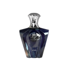 The image presents a sleek perfume bottle with a geometric design. The bottle has a deep blue color with a glossy, reflective surface, and features silver accents. The cap is silver and has an inverted cup shape that complements the bottle's shoulders. On the front, in silver lettering, is the name "Turathi" beneath an emblem with Arabic calligraphy, indicating the fragrance name or brand.
