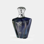The image shows a perfume bottle with a distinctive, multifaceted design. The body of the bottle is a deep, dark blue with a shiny, reflective surface that catches light at various angles. At the center, in white, is Arabic calligraphy and the word "Turathi," suggesting the name of the fragrance. Below the calligraphy, the name "AFNAN" is printed, indicating the brand of the perfume. The cap is silver, polished to a high shine, and has a design that mirrors the angular lines of the bottle.