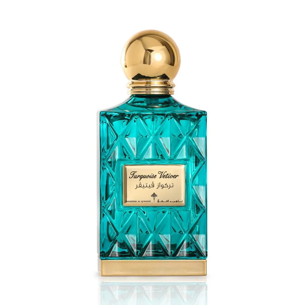 A turquoise glass perfume bottle with a diamond pattern and a golden cap. The bottle features a label with 'Turquoise Vetiver' in elegant script, alongside Arabic script and the brand name 'IBRAHEEM AL.QURASHI'. The design of the bottle reflects a luxurious and contemporary aesthetic.