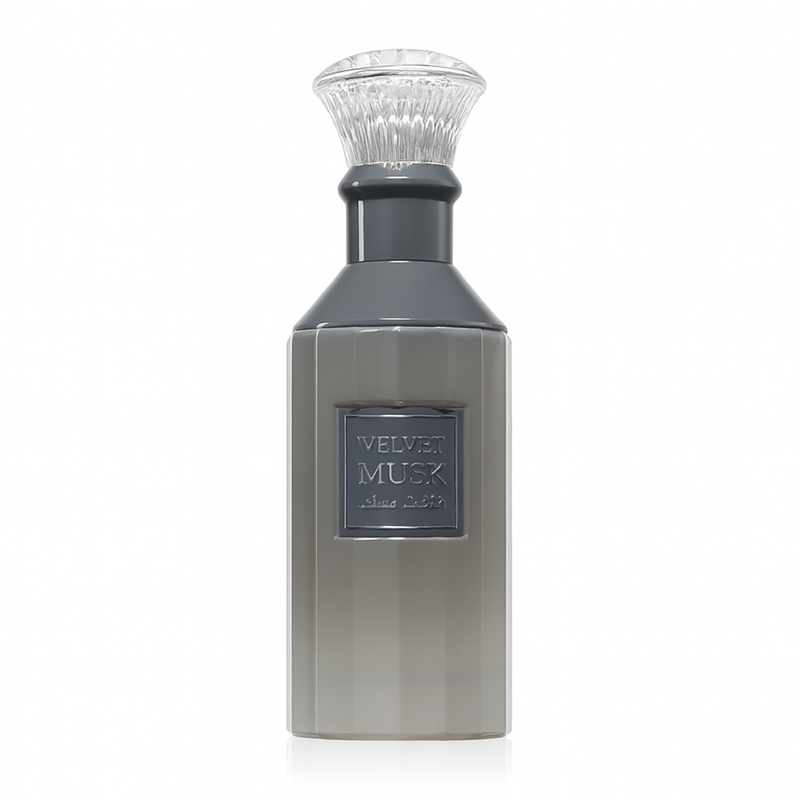 Velvet Musk perfume in a sleek grey bottle with clear textured cap and silver label.