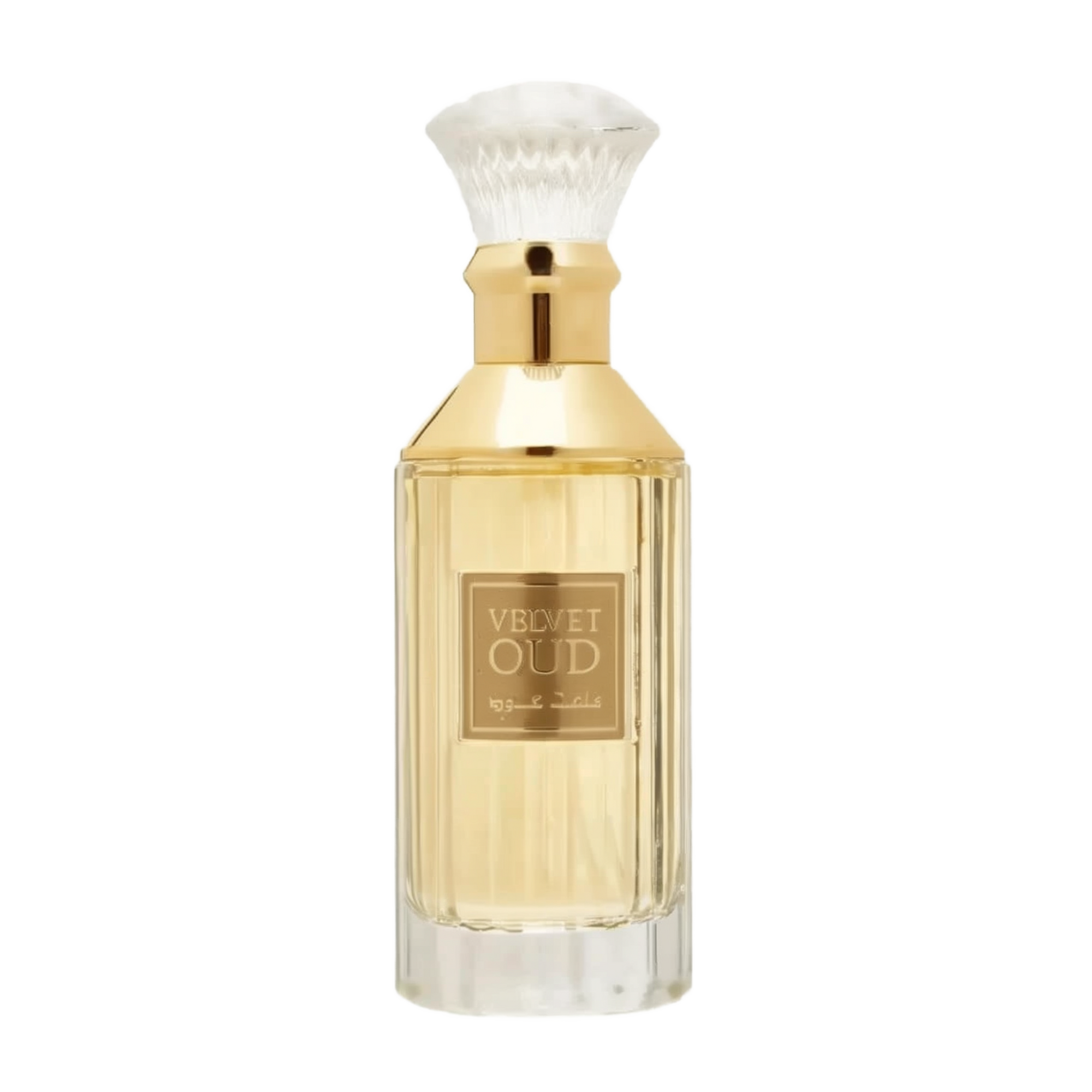 The image is of a perfume bottle:  The bottle has a rectangular shape with clear glass, revealing the golden-colored liquid perfume inside. It features a gold-colored neck and a white, bristle-like applicator that resembles a traditional shaving brush. The front of the bottle has a simple, elegant label with "VELVET OUD" in black letters and Arabic script below it.