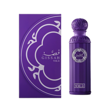 A sleek, cylindrical purple perfume bottle with an ornate spherical cap, labeled “Gissah Voila!” in silver, standing next to a matching purple box adorned with a stylized silver pattern.
