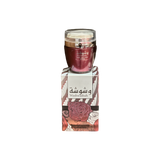 The image shows a product named "Washwashah Hand and Body Lotion." The lotion comes in a dark red container with a clear lid and is placed on top of a matching red and beige box adorned with intricate floral patterns and Arabic calligraphy. The box prominently features the product name "Washwashah" along with an illustration of a rose. The elegant and artistic packaging suggests a luxurious and high-quality skincare product.