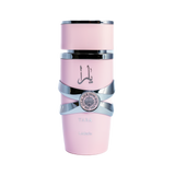 This image depicts a cylindrical, pale pink perfume bottle with the name "YARA" from the brand Lattafa. The bottle has a unique stacked design with silver bands wrapping around it, giving the appearance of three separate sections. The upper and lower sections are matte pink, while the middle section is glossy black, providing a striking contrast. A silver emblem with intricate detailing is centered on the middle band. The Arabic script, likely the name "YARA," is printed in black on the upper pink section.