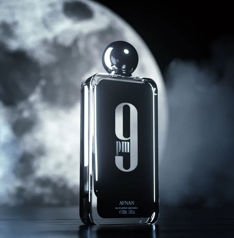 Afnan 9PM men’s eau de parfum 100 ml bottle against full moon and misty night backdrop