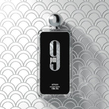 Afnan 9PM men’s eau de parfum 100 ml bottle on silver scallop-tile background