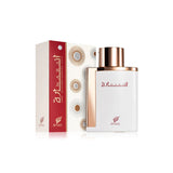The image showcases a perfume bottle and its packaging. The bottle has a flat, rectangular shape with rounded edges, featuring a glossy white finish and a metallic rose gold cap. The front of the bottle displays the perfume's name "إنارة" in elegant red Arabic script, with the "AFNAN" logo in red below. Accompanying the bottle is its box, which has a white background with geometric circular patterns and a bold red side panel where the perfume's name and brand logo are repeated in white and red.