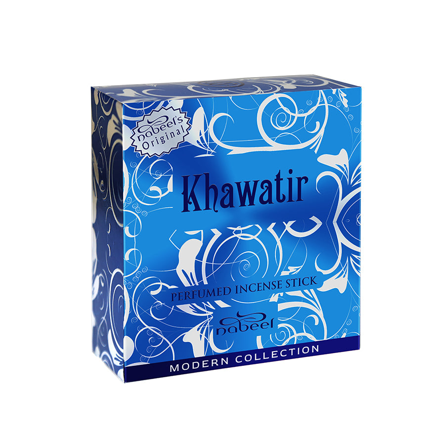 The product is a cube-shaped box for Khawatir incense sticks by Nabeel Perfumes, part of the Modern Collection. The box is vibrant blue with elaborate white floral and swirl patterns. It features the brand name 'Nabeel's Original' and the product name 'Khawatir' prominently in white, along with the text 'PERFUMED INCENSE STICK' in English. There's also a white silhouette of a hand with a floating incense stick illustration.