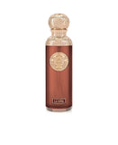 The image shows a perfume bottle named "La Luna" from the Gissah Signature Collection. The bottle is a glossy copper color with a cylindrical shape, and it features a decorative gold medallion in the center. The cap is a matching gold color with an ornate, embossed design, and the name "Gissah" is inscribed just below the neck of the bottle. At the bottom of the bottle, the name "LA LUNA" is displayed on a gold plaque, indicating the fragrance's name.